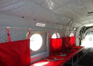 Aircraft-acoustical-insulation-blanket-modernization-ehmke Modernized aircraft acoustical insulation blankets installed inside military transport cabin.