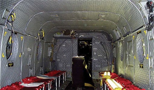 Modernized aircraft acoustical insulation blankets installed inside military transport cabin.