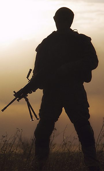 Silhouette of a tactical soldier equipped with Berry Amendment compliant military gear manufactured by Ehmke.