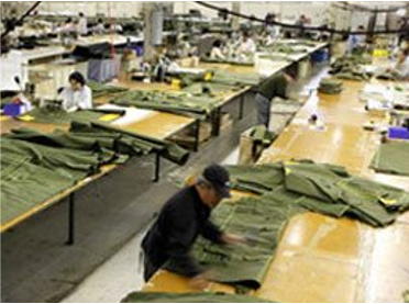custom-military-textile-sewing-facility-ehmke Seamstresses fabricating olive drab military soft goods at Ehmke Manufacturing facility.