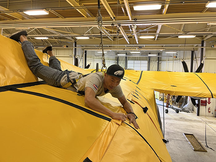 SkyShield hailstorm protective aircraft cover fitted on a C-130 military transport plane.